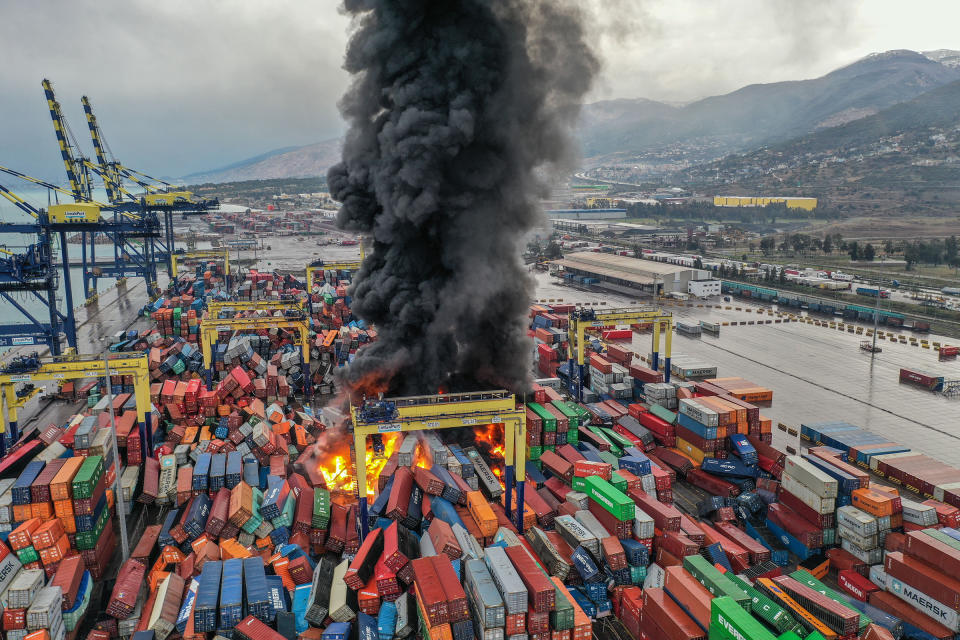 An aerial view of shipping containers on fire after an the earthquakes in Hatay, Turkey.<span class="copyright">Murat Sengul—Anadolu Agency/Getty Images</span>