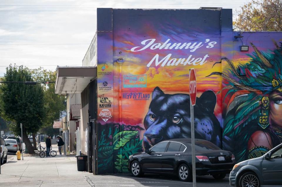 New mural by muralist Jose “Hocus” Manriquez on the east wall of Johnny’s Market on H Street in Modesto, Calif., Wednesday, Nov. 22, 2023.