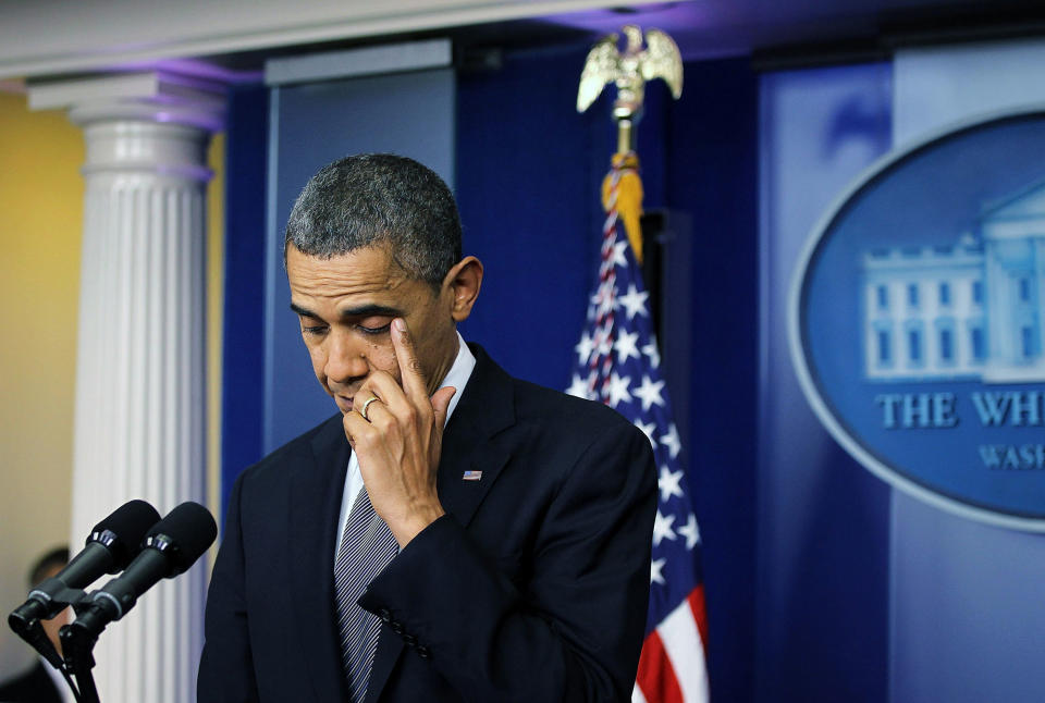 <p>President Barack Obama wipes tears as he makes a statement in response to the elementary school shooting in Connecticut December 14, 2012 at the White House in Washington, DC. According to reports, there are 27 dead, 20 of them children, after Adam Lanza opened fire at the Sandy Hook Elementary School in Newtown, Connecticut. Reports say that Lanza is dead at the scene and his mother, a teacher at the school, is also dead. (Alex Wong/Getty Images) </p>