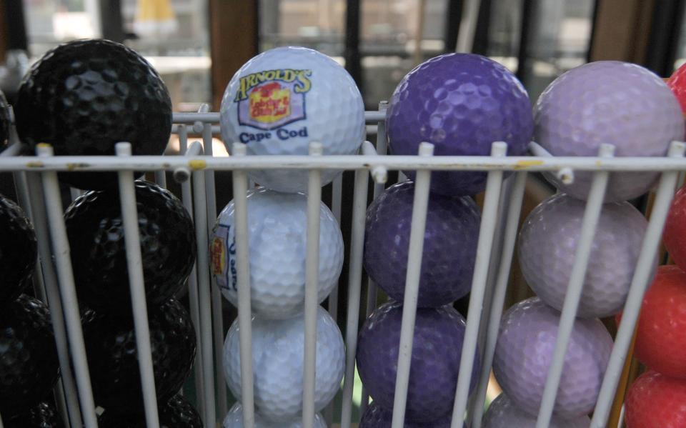 Balls await mini golf players at Arnold's Lobster & Clam Bar in Eastham.