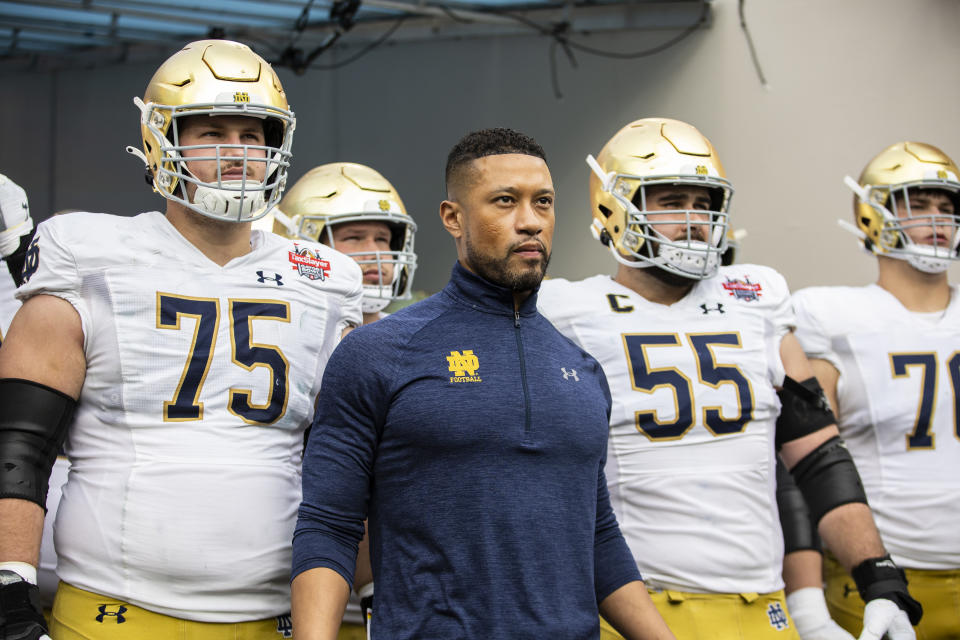 JACKSONVILLE, FLORIDA - DECEMBER 30: Head coach Marcus Freeman of the Notre Dame Fighting Irish looks on before the start of the TaxSlayer Gator Bowl against the South Carolina Gamecocks at TIAA Bank Field on December 30, 2022 in Jacksonville, Florida. (Photo by James Gilbert/Getty Images)