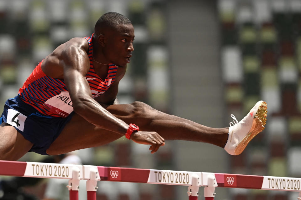 USA's Grant Holloway competes in the men's 110m hurdles semi-finals during the Tokyo 2020 Olympic Games at the Olympic Stadium in Tokyo on August 4, 2021. (Photo by Ina FASSBENDER / AFP) (Photo by INA FASSBENDER/AFP via Getty Images)