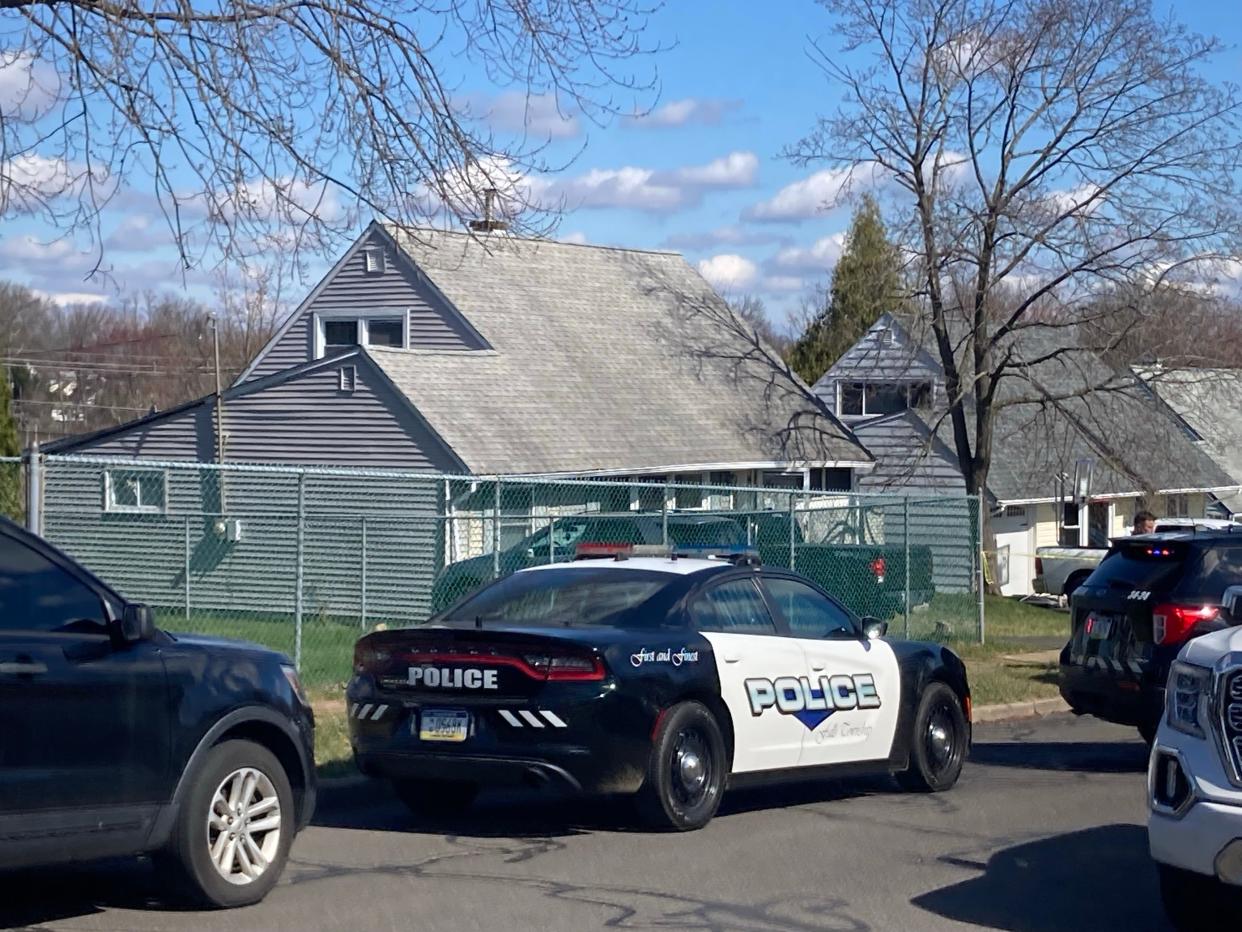 Police activity along Viewpoint Lane in Falls Township March 16. A shooting canceled events and closed businesses in the Levittown area Saturday.