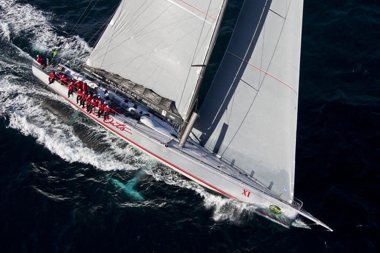 This Rolex handout photo released on December 27, 2012 shows race leader supermaxi Wild Oats XI streaking away. A lighter breeze during the night saw second-placed Ragamuffin-Loyal close the gap in the annual Sydney to Hobart dash, but as northeasterly breezes kicked in, Wild Oats XI pulled away again in near-perfect downwind conditions