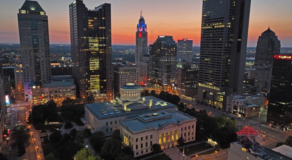 July 10, 2023; Columbus, Ohio, USA; Downtown Columbus around the Ohio Statehouse photographed July 10, 2023. Tall buildings around the Statehouse include the Vern Riffe Center, The Huntington Center, The LeVeque Tower, One Columbus, The Rhodes State Office Tower and the Key Bank building.  Mandatory Credit: Doral Chenoweth-The Columbus Dispatch