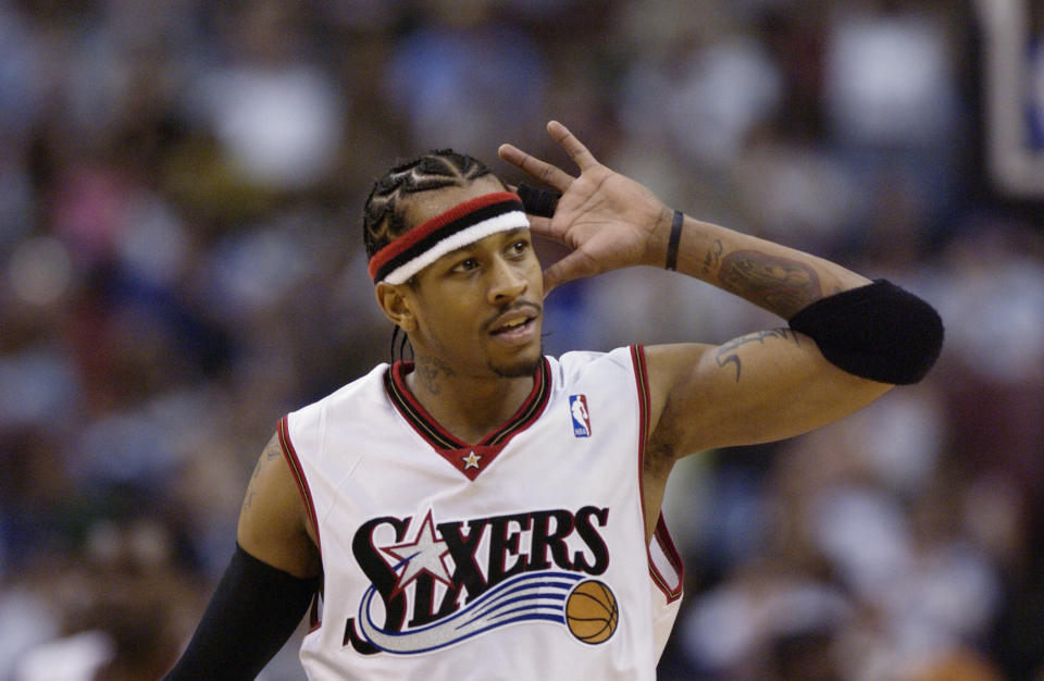 Allen Iverson of the Philadelphia 76ers gestures to hear cheers from the crowd during a game against the Washington Wizards on March 30, 2003. (Photo: Ezra Shaw via Getty Images)