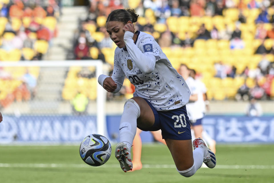 United States' Trinity Rodman is airborne as she attempts to control the ball during the Women's World Cup Group E soccer match between the United States and the Netherlands in Wellington, New Zealand, Thursday, July 27, 2023. (AP Photo/Andrew Cornaga)