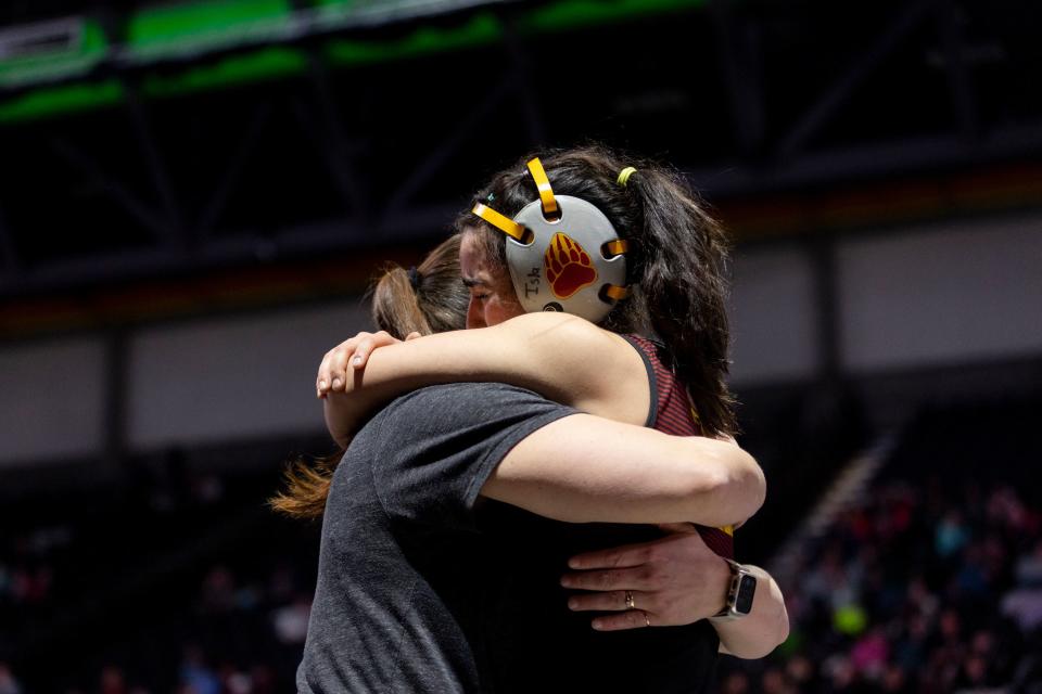 Mountain View’s Isla Baez celebrates a win with her coach during the 4A Girls Wrestling State Championships at the UCCU Center in Orem on Thursday, Feb. 15, 2024. | Marielle Scott, Deseret News
