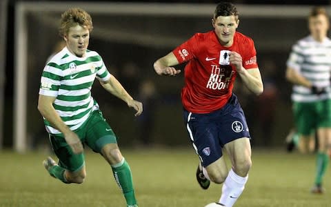 Andy Brennan (R) of South Hobart controls the ball during the FFA Cup match between South Hobart and Tuggeranong at KGV Park on August 5, 2014 in Hobart, Australia - Credit: Getty Images