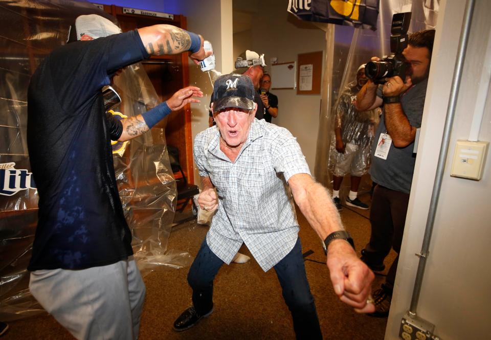 Bob Uecker gets in on the fun as the Brewers celebrate making the playoffs.