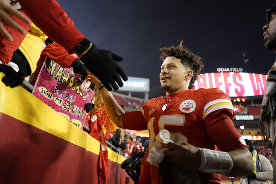 Kansas City Chiefs quarterback Patrick Mahomes celebrates following an NFL football game against the Cincinnati Bengals Sunday, Dec. 31, 2023, in Kansas City, Mo. The Chiefs won 25-17 to clinch the AFC West. (AP Photo/Charlie Riedel)