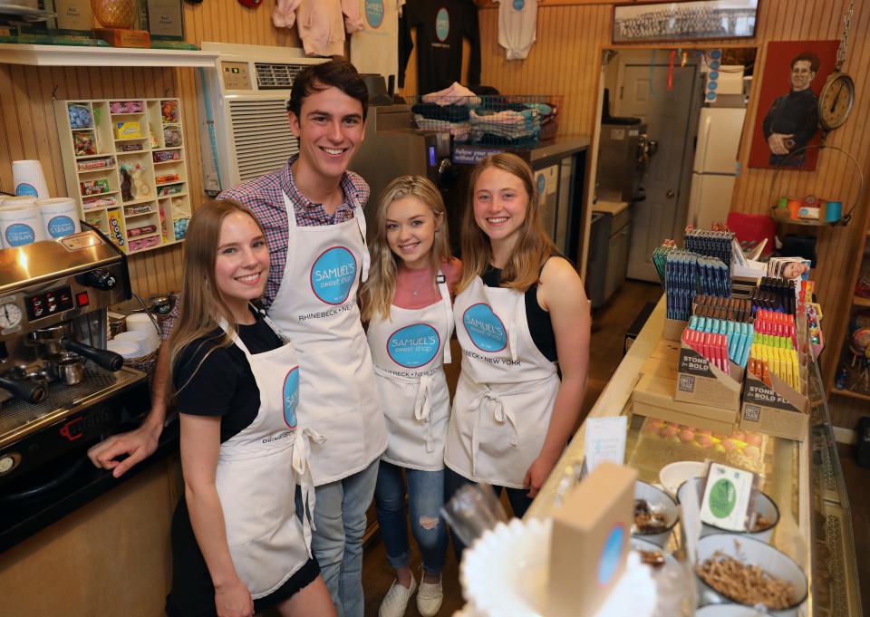 Shop workers Victoria Lindquist, Jack Quartararo, Julia Beyer and Caroline Voorhis are pictured at Samuel's Sweet Shop in Rhinebeck, April 13, 2019. The shop is celebrating it's 25th anniversary this month. 