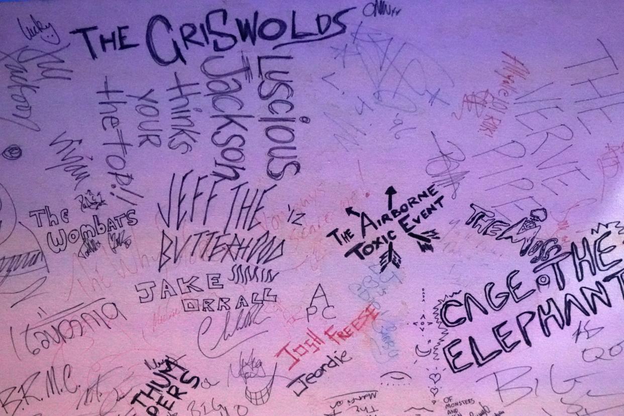 Jan. 31, 2024; Columbus, Ohio, USA; 
The ceiling at CD 92.9 FM's Big Room Bar is decorated by signatures of bands who have performed there.