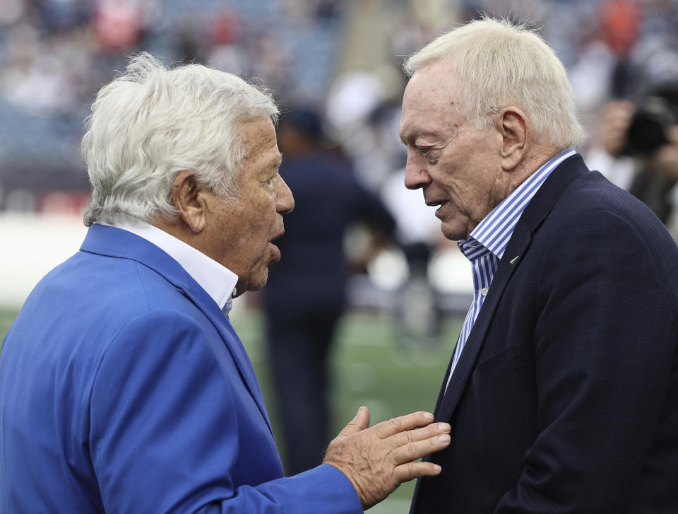 Chairman and CEO of the New England Patriots, Robert Kraft, left, talks with Jerry Jones, owner, president and GM of the Dallas Cowboys before an NFL football game at Gillette Stadium, Sunday, Oct. 17, 2021 in Foxborough, Mass. (Winslow Townson/AP Images for Panini)