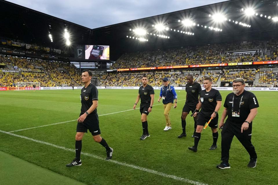 Referee Sergii Boyko walks off the field at halftime of the Crew's game against New York City on Saturday.