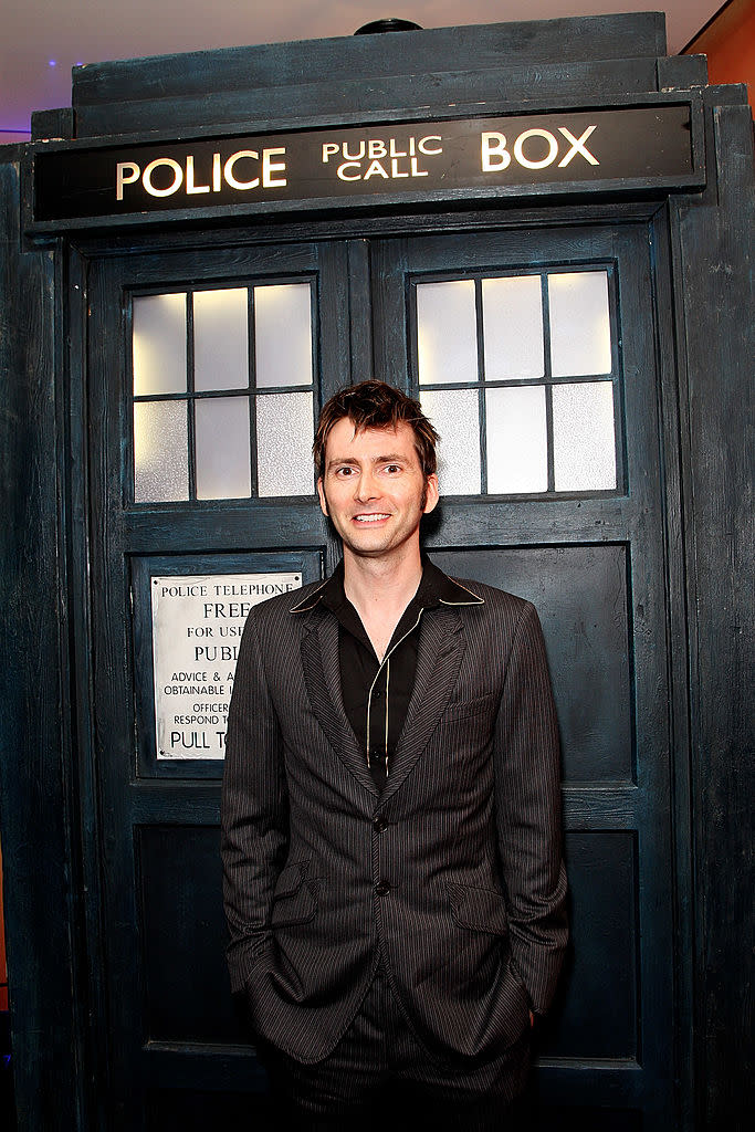 David Tennant celebrated the Season 4 premiere of<em> Doctor Who,</em> standing in front of a Tardis, in 2008 in London, England. <span class="copyright">Dave Hogan–Getty Images </span>
