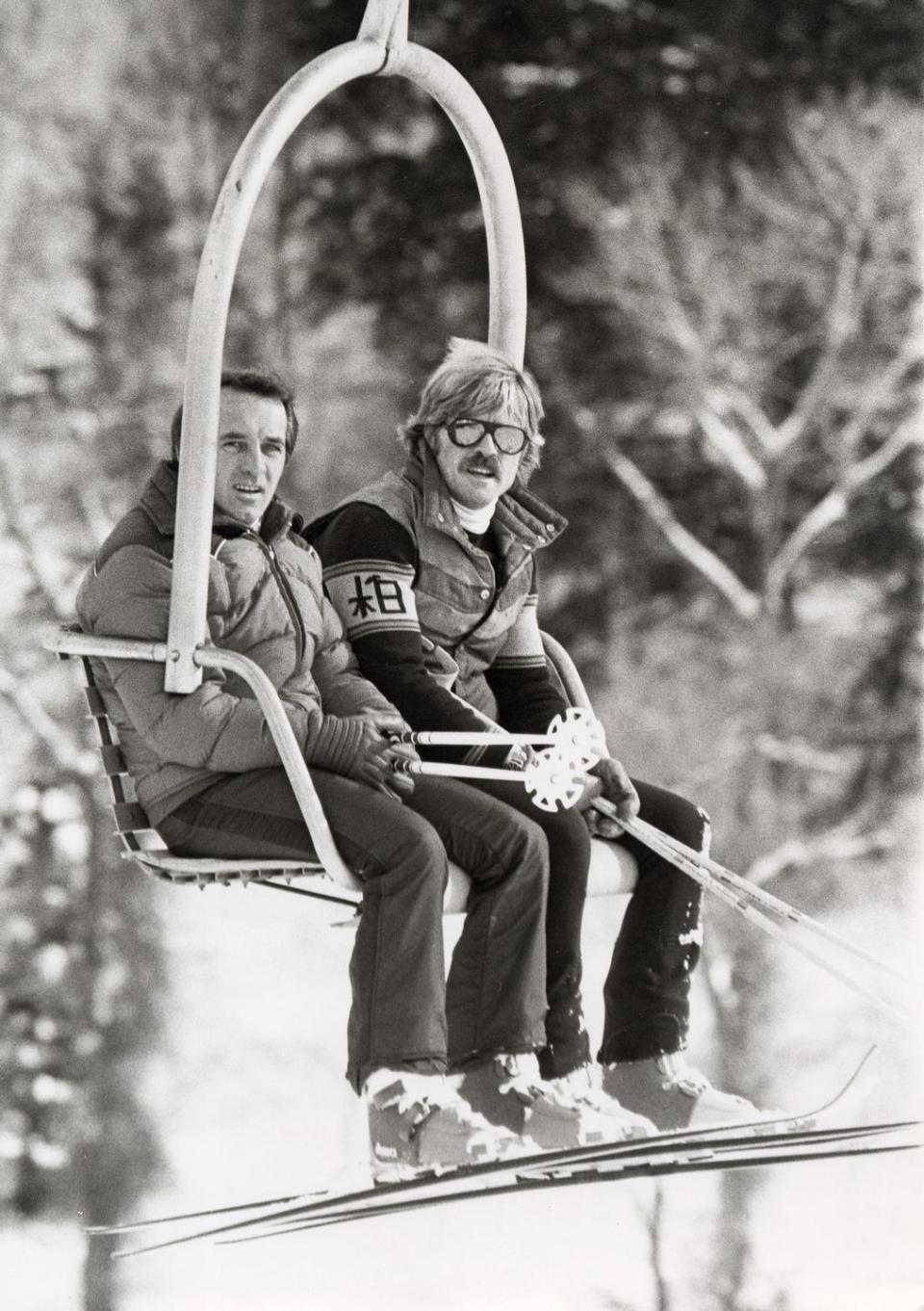 <p>Robert Redford rides the ski lift during a trip to Sundance in December 1977. <br></p>