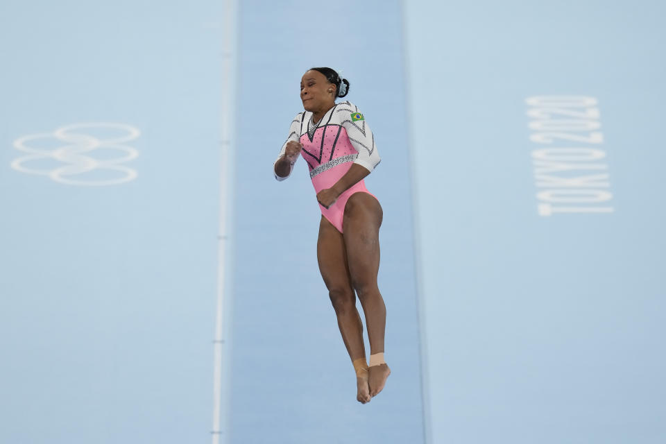 Rebeca Andrade of Brazil, performs on the vault during the artistic gymnastics women's apparatus final at the 2020 Summer Olympics, Sunday, Aug. 1, 2021, in Tokyo, Japan. (AP Photo/Gregory Bull)