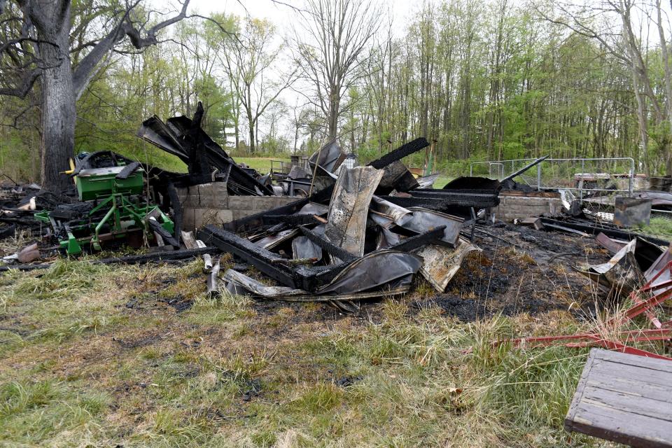 Investigators are working to find the cause of a fire Sunday that destroyed a storage barn on the historic Fasnacht Farm in Perry Township.