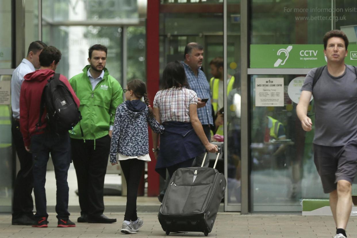 Camden evacuation: Residents arrive at Swiss Cottage Leisure Centre where some residents are being temporarily rehoused: AP