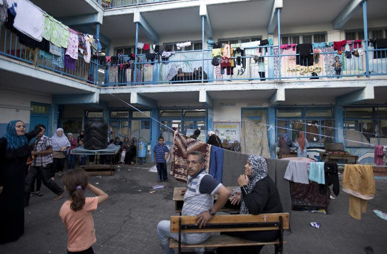 Displaced Palestinians take shelter at a school in the Jabalia refugee camp in the northern Gaza Strip on August 2, 2014