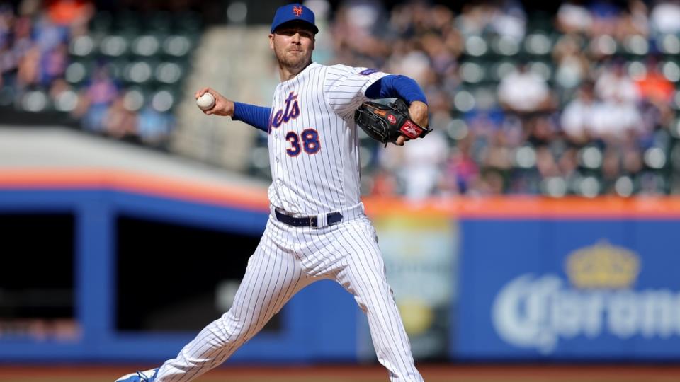 May 6, 2023; New York City, New York, USA; New York Mets starting pitcher Tylor Megill (38) pitches against the Colorado Rockies during the first inning at Citi Field.