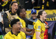 Dortmund's Marcel Sabitzer, right, celebrates his side's 4th goal during the Champions League quarterfinal second leg soccer match between Borussia Dortmund and Atletico Madrid at the Signal-Iduna Park in Dortmund, Germany, Tuesday, April 16, 2024(AP Photo/Martin Meissner)