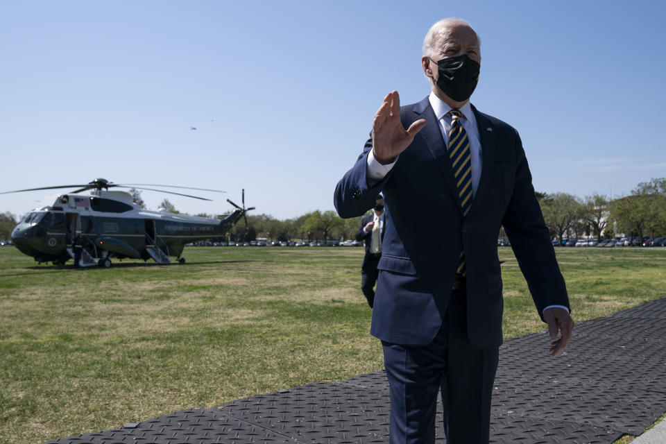 President Joe Biden talks with reporters on the Ellipse on the National Mall after spending the weekend at Camp David, Monday, April 5, 2021, in Washington. (AP Photo/Evan Vucci)