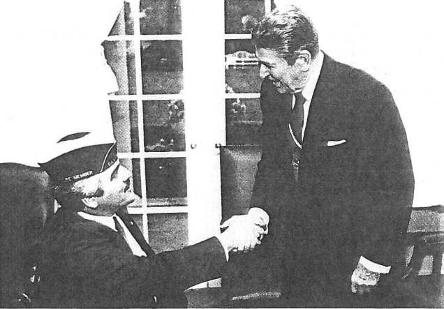 Gene Murphy (left), a Vietnam War veteran and then-DAV National Commander, shakes hands with President Ronald Reagan after the president announced he would support the creation of a Cabinet-level Department of Veterans Affairs.