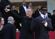 Tom Hanks, from left, and Alton Mason pose for photographers upon arrival at the premiere of the film 'Elvis' at the 75th international film festival, Cannes, southern France, Wednesday, May 25, 2022. (AP Photo/Petros Giannakouris)