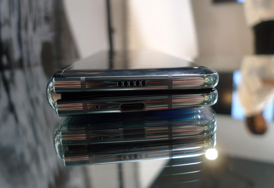 FILE - In this April 16, 2019, file photo, the Samsung Galaxy Fold phone is seen in its folded position during a media preview event in London. Some of Samsung's new $2,000 folding phones appear to be breaking after just a couple of days. Journalists who received the phones to review before the public launch say the Galaxy Fold screen started flickering and turning black before completely fizzling out. (AP Photo/Kelvin Chan, File)