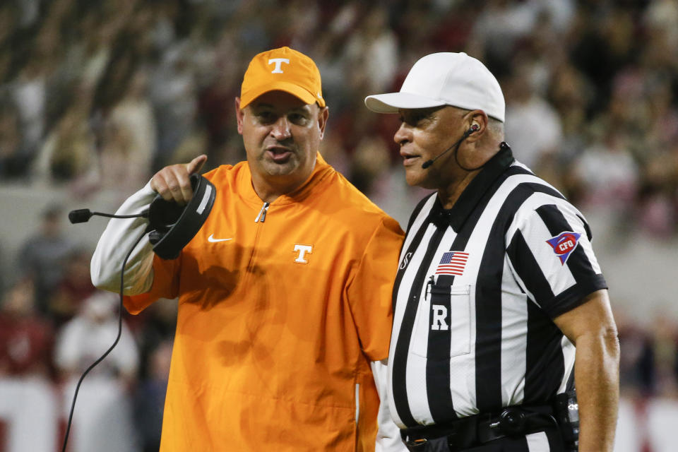 Grabbing your quarterback's facemask, Jeremy Pruitt? That ain't it. (Reuters)