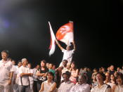 PAP supporters waving the Singapore flag at the rally. Monday, May 2. (Yahoo! photo/ Faris Mokhtar)