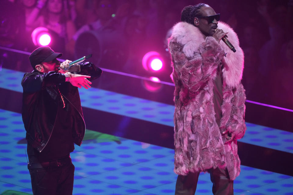 Eminem, left, and Snoop Dogg perform "From the D 2 the LBC"at the MTV Video Music Awards at the Prudential Center on Sunday, Aug. 28, 2022, in Newark, N.J. (Photo by Charles Sykes/Invision/AP)