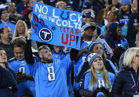 Oct 16, 2017; Nashville, TN, USA; A Tennessee Titans fan holds a sign during the second half against the Indianapolis Colts at Nissan Stadium. Mandatory Credit: Christopher Hanewinckel-USA TODAY Sports