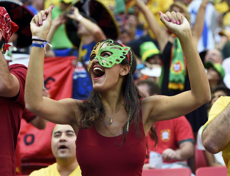 A Portugal fan attends the 2014 World Cup Group G soccer match against Ghana at the Brasilia national stadium in Brasilia June 26, 2014. REUTERS/Dylan Martinez (BRAZIL - Tags: SOCCER SPORT WORLD CUP)