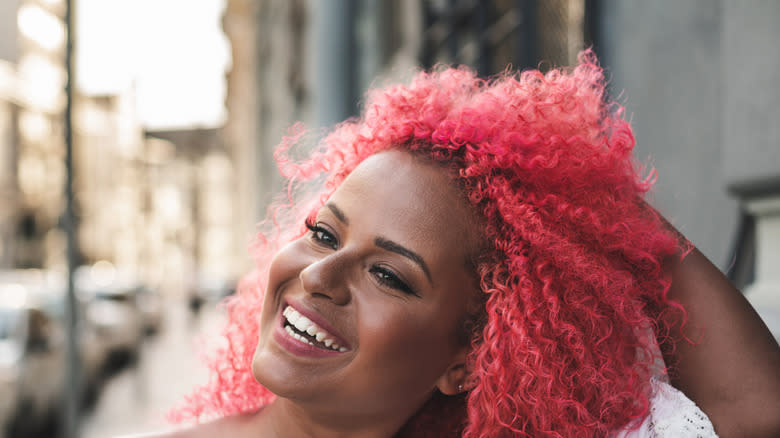 Woman with pink hair