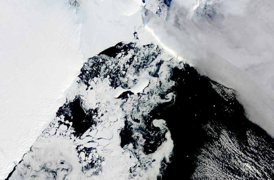 This satellite image provided by NASA, Aqua MODIS 21 on March 2022 shows the two pieces of C-38 (A and B icebergs) next to the main piece of C-37 at the top. Scientists are concerned because an ice shelf the size of New York City collapsed in East Antarctica, an area that had long been thought to be stable. The collapse last week was the first time scientists have ever seen an ice shelf collapse in this cold area of Antarctica. (NASA via AP)