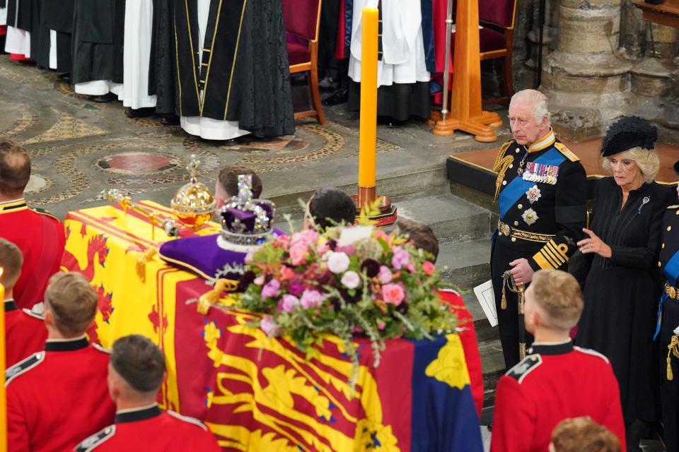 King Charles III wrote a note that was tucked in the wreath atop Queen Elizabeth II's coffin.