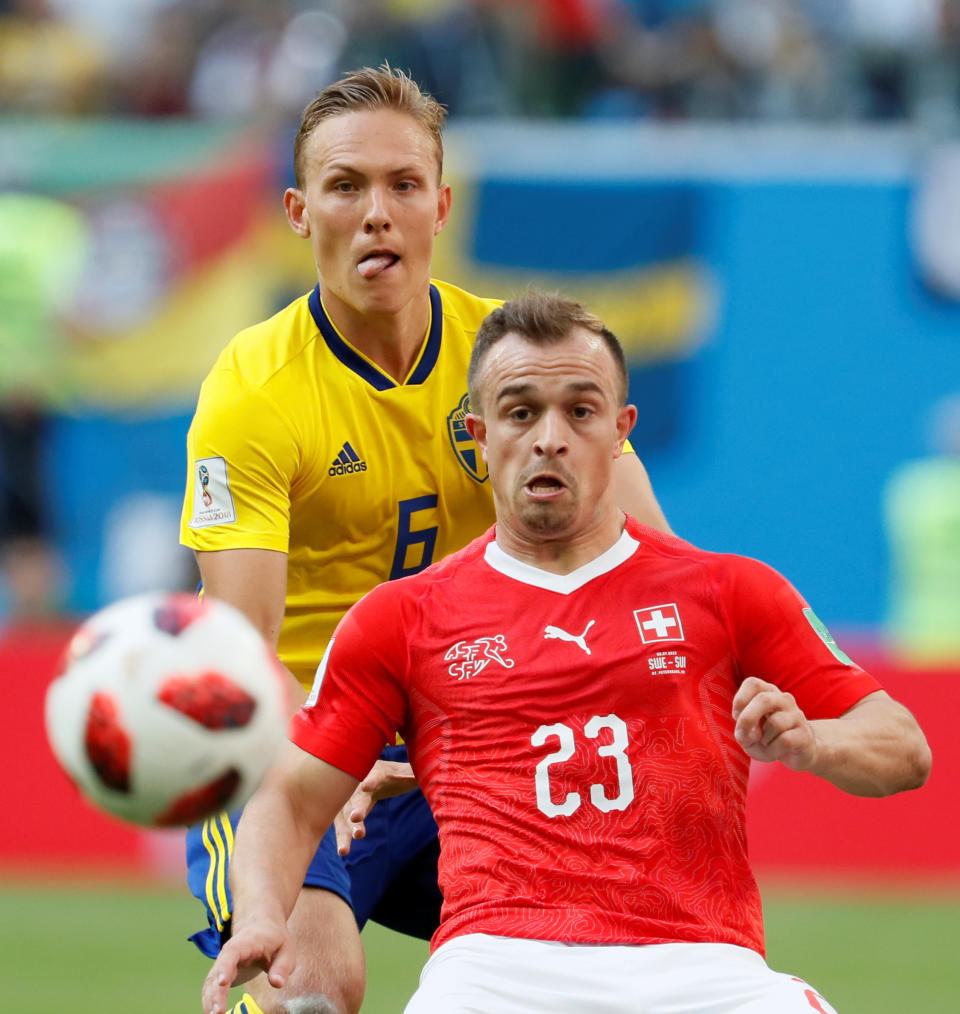 <p>Ludwig Augustinsson (L) of Sweden national team and Xherdan Shaqiri of Switzerland national team vie for the ball during the 2018 FIFA World Cup Russia Round of 16 match between Sweden and Switzerland at Saint Petersburg Stadium on July 3, 2018 in Saint Petersburg, Russia. (Photo by MB Media/Getty Images) </p>