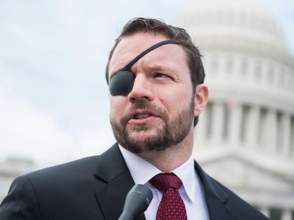 Rep. Dan Crenshaw, a Republican of Texas, stands outside the US Capitol