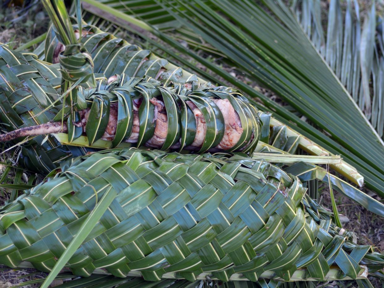 Fijian food called Lovo, a Fijian feast cooked in the earth.