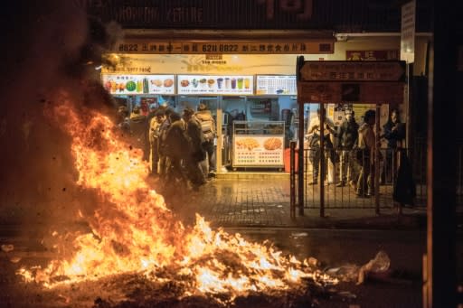 Ray Wong and Alan Li are wanted for riot charges relating to Lunar New Year clashes in February 2016, when protesters hurled bricks torn up from pavements and set rubbish alight in the commercial district of Mong Kok