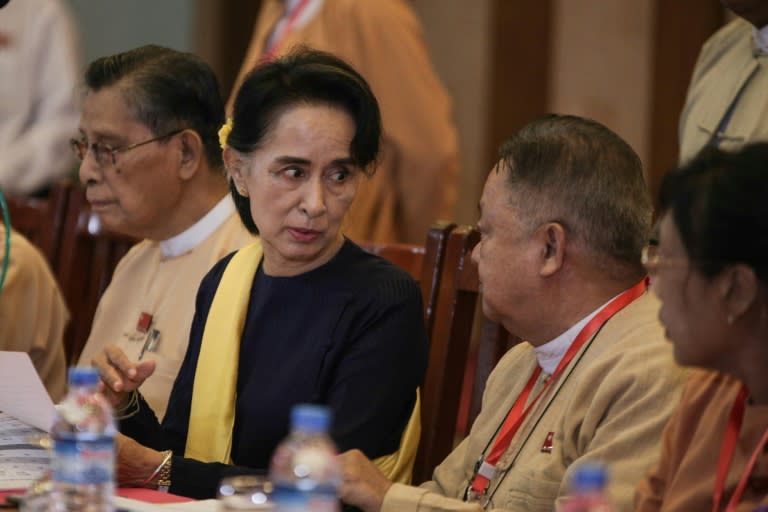 Aung San Suu Kyi (2nd L), leader of the National League For Democracy party, meets with her elected NLD candidates in Yangon on November 28, 2015