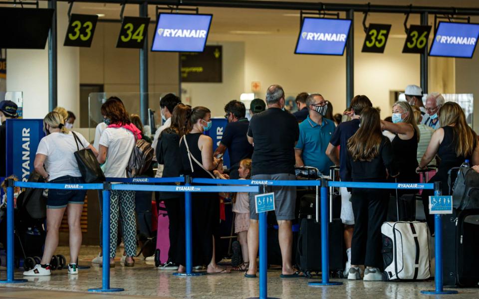 British people gather at Faro Airport as they interrupt their holidays in the Algarve to return home due to the British government's new quarantine rules about the COVID-19 pandemic, in Faro, Portugal, 07 June 2021. Portugal will be removed from Britain's green travel list from 08 June amid rising coronavirus disease (COVID-19) cases and concern over new virus variants. British tourists interrupt holidays in the Algarve, Portugal, Faro - 07 Jun 2021 - LUIS FORRA/EPA-EFE/Shutterstock