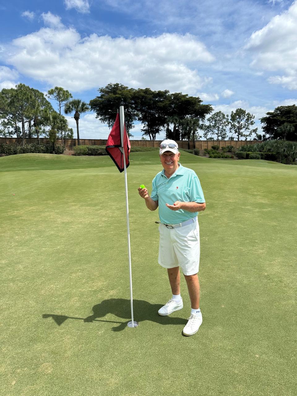 Vincent Costa shows off the ball from his hole-in-one at the Vasari Country Club in Bonita Springs on Monday, April 1, 2024. Costa who celebrated his 85th birthday the day before on Easter Sunday, has been legally blind for more than 20 years.