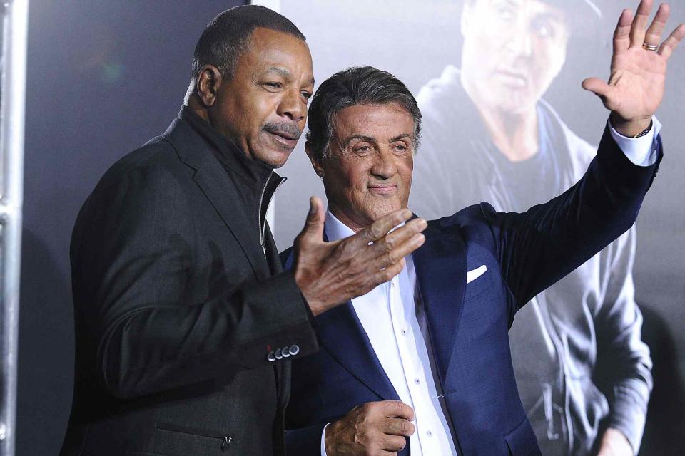 <p>Jason LaVeris/FilmMagic</p> Carl Weathers and Sylvester Stallone in November 2015