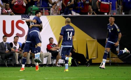 Jun 21, 2016; Houston, TX, USA; Argentina midfielder Lionel Messi (10) celebrates with teammates after scoring a goal during the first half against the United States in the semifinals of the 2016 Copa America Centenario soccer tournament at NRG Stadium. Kevin Jairaj-USA TODAY Sports