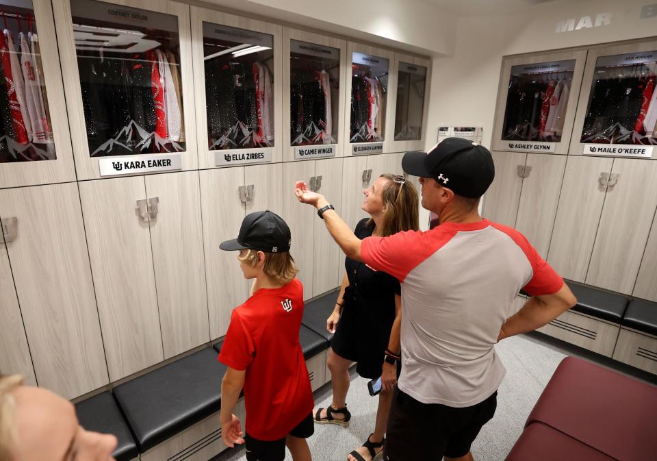 Henry Zirbes, Jane Zirbes and Jeremy Zirbes check out Ella Zirbes’ locker during a ribbon-cutting event for the Dumke Gymnastics Center’s expansion at the University of Utah in Salt Lake City on Thursday, Aug. 17, 2023. | Kristin Murphy, Deseret News