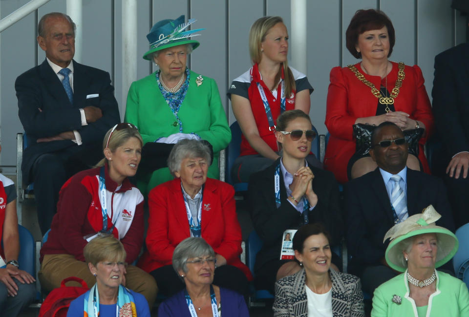 Queen Elizabeth II watches the Women's preliminary match between England and Wales as she visits the Glasgow National Hockey Centre to watch the hockey during day one of the Glasgow 2014 Commonwealth Games on July 24, 2014 in Glasgow, United Kingdom.